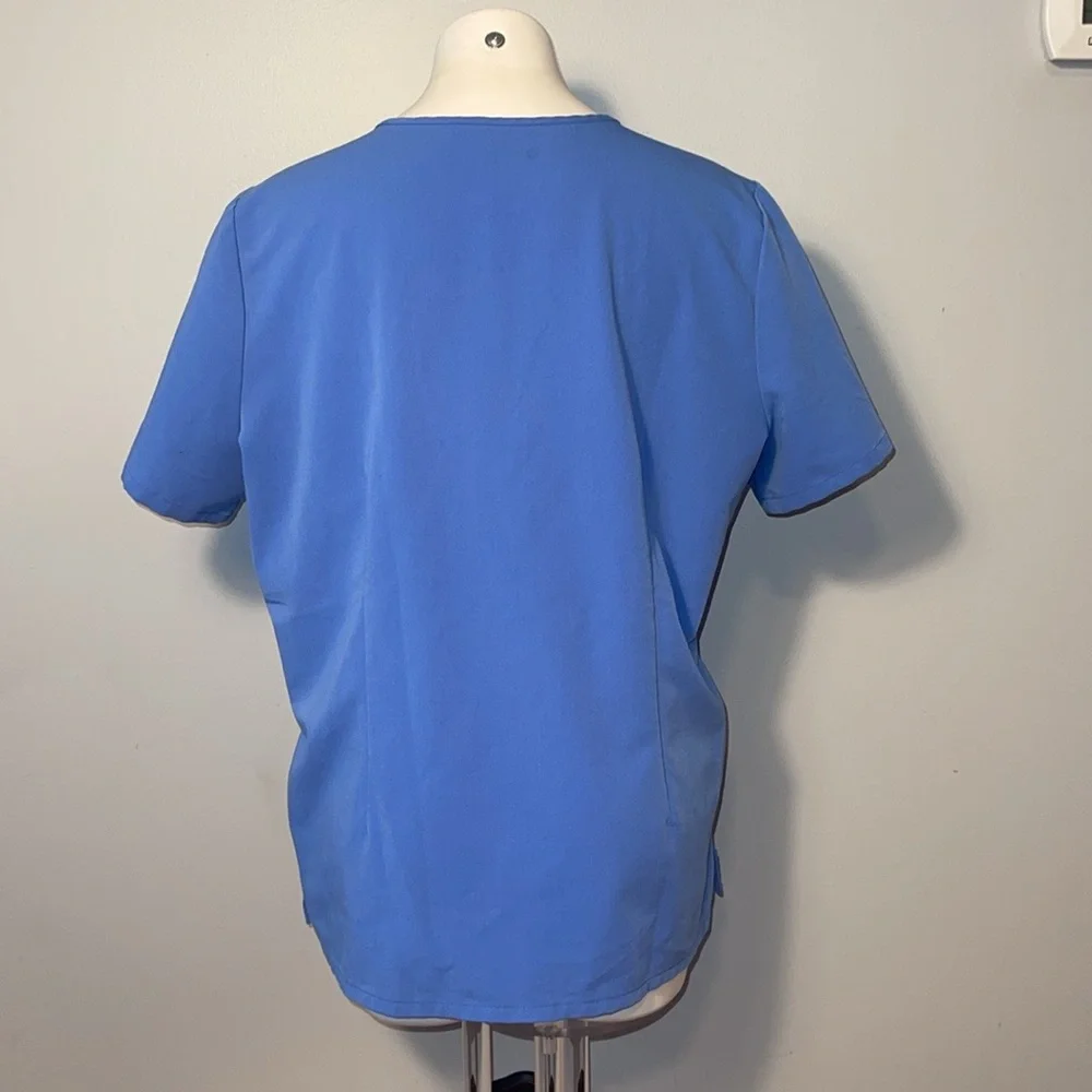 Figs Technical Collection ladies XL Light blue scrub top.